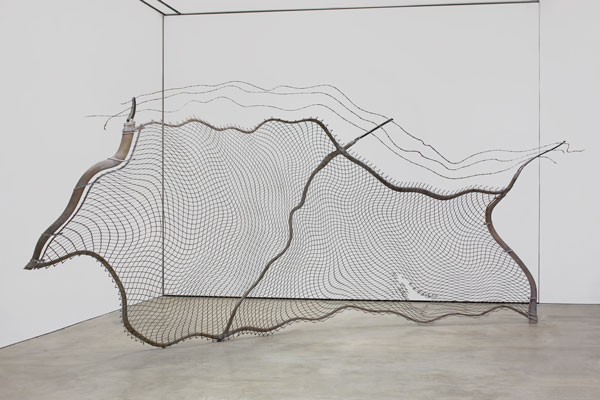 Robert Lazzarini, chain-link fence (Torn), 2012 steel and pigment; 134 x 276 x 75 inches.