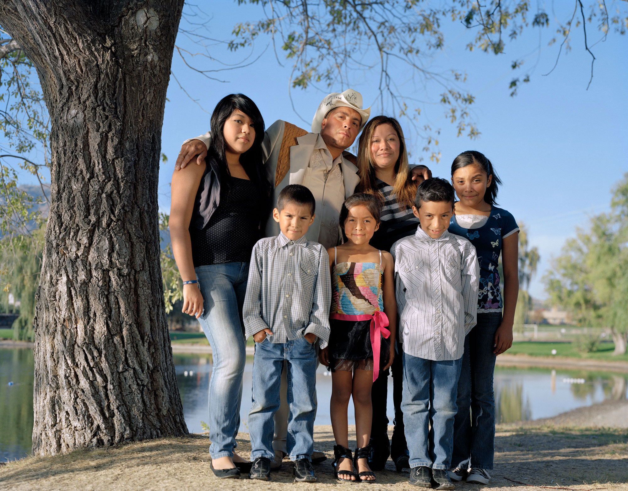 Kathya Maria Landeros, Juan's family, Eastern Washington, 2012. Courtesy of the artist. From the USFCAM exhibtion, The Neighbors: Slide Shows for America.